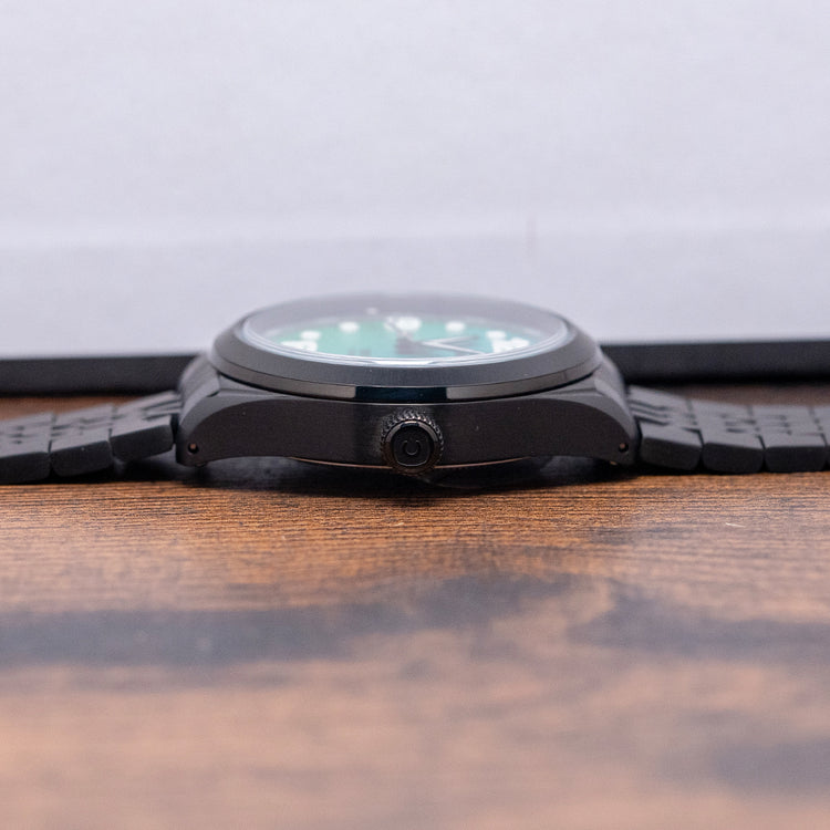 2025 UBIQ TREK CoralGlow Dial Mechaquartz Titanium 38mm