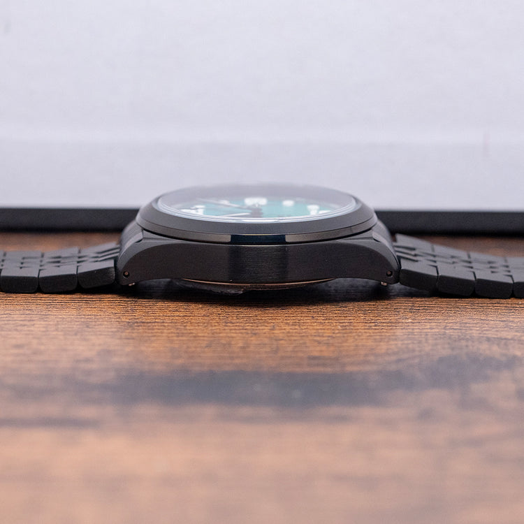 2025 UBIQ TREK CoralGlow Dial Mechaquartz Titanium 38mm