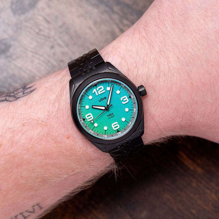 2025 UBIQ TREK CoralGlow Dial Mechaquartz Titanium 38mm