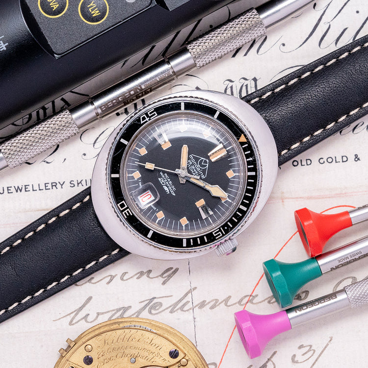 1970s Mondaine Oval Skin Diver Automatic Bakelite Bezel 38mm