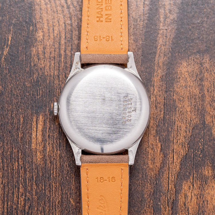 1953 Universal Geneve "J.W.Benson London" 206514 34mm