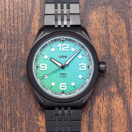 2025 UBIQ TREK CoralGlow Dial Mechaquartz Titanium 38mm