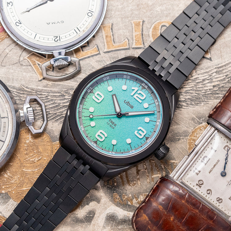 2025 UBIQ TREK CoralGlow Dial Mechaquartz Titanium 38mm